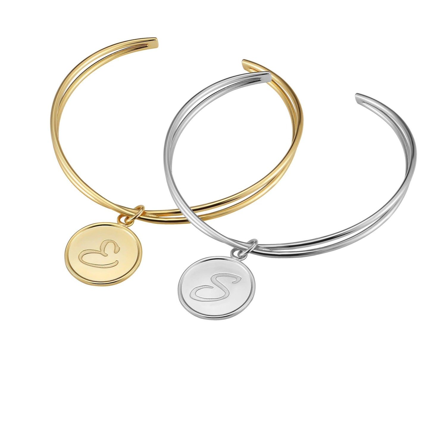 Infinity Initial Bracelet in sterling silver. Available in silver and gold finishes.