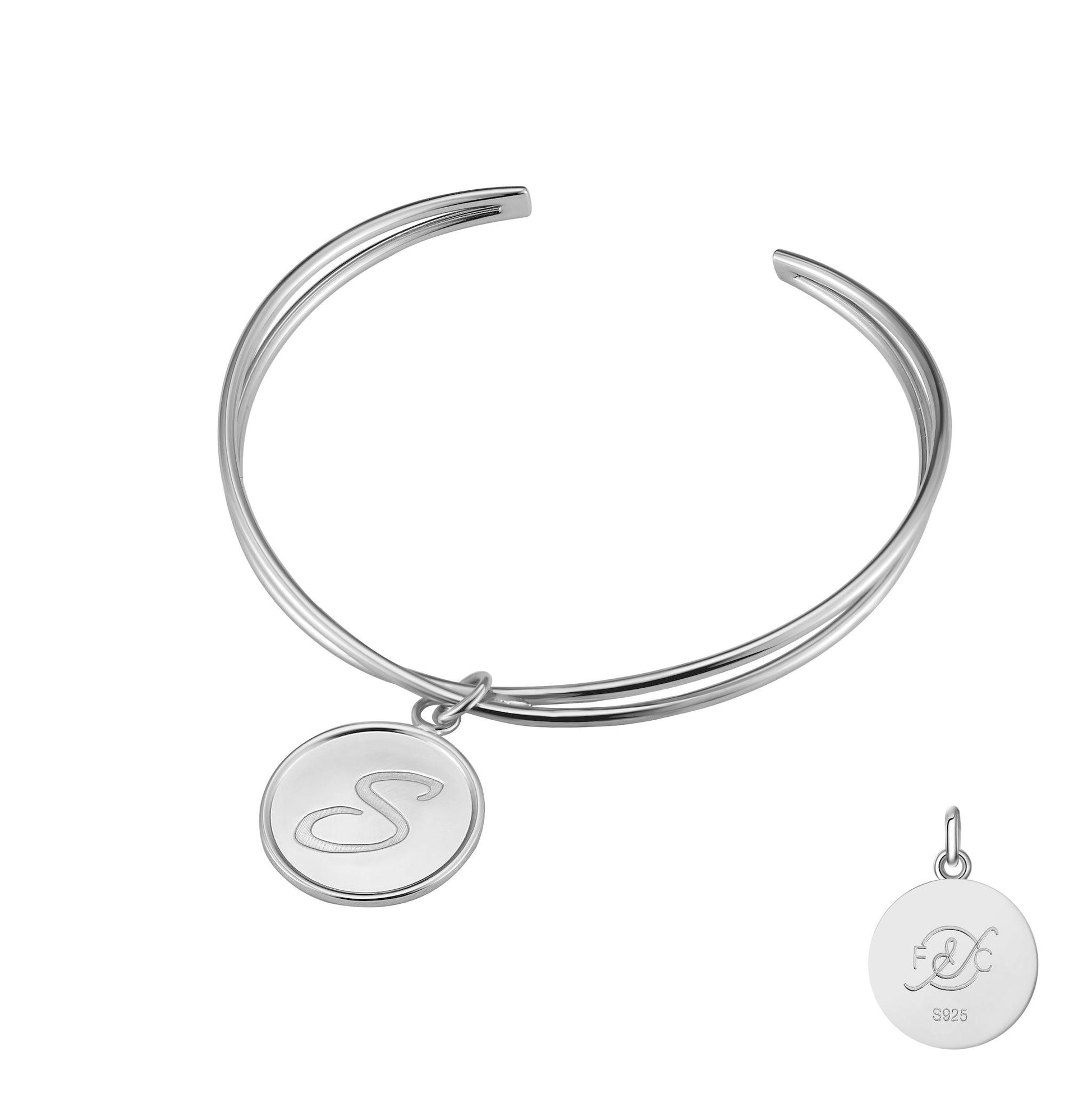 Infinity Initial Bracelet crafted in sterling silver, include an initial letter charm in a beautiful script.